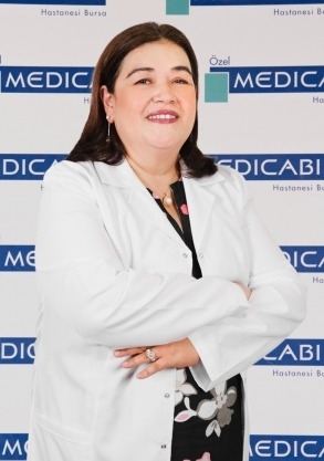 Dr.  Emel UCGUL
