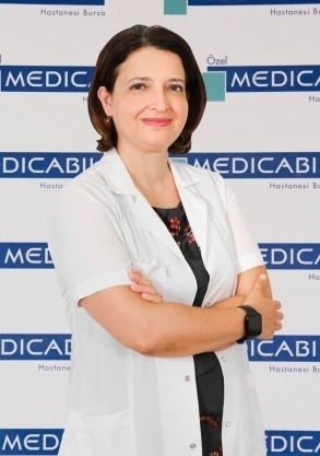 MD.  Yeliz  KARAKAYA